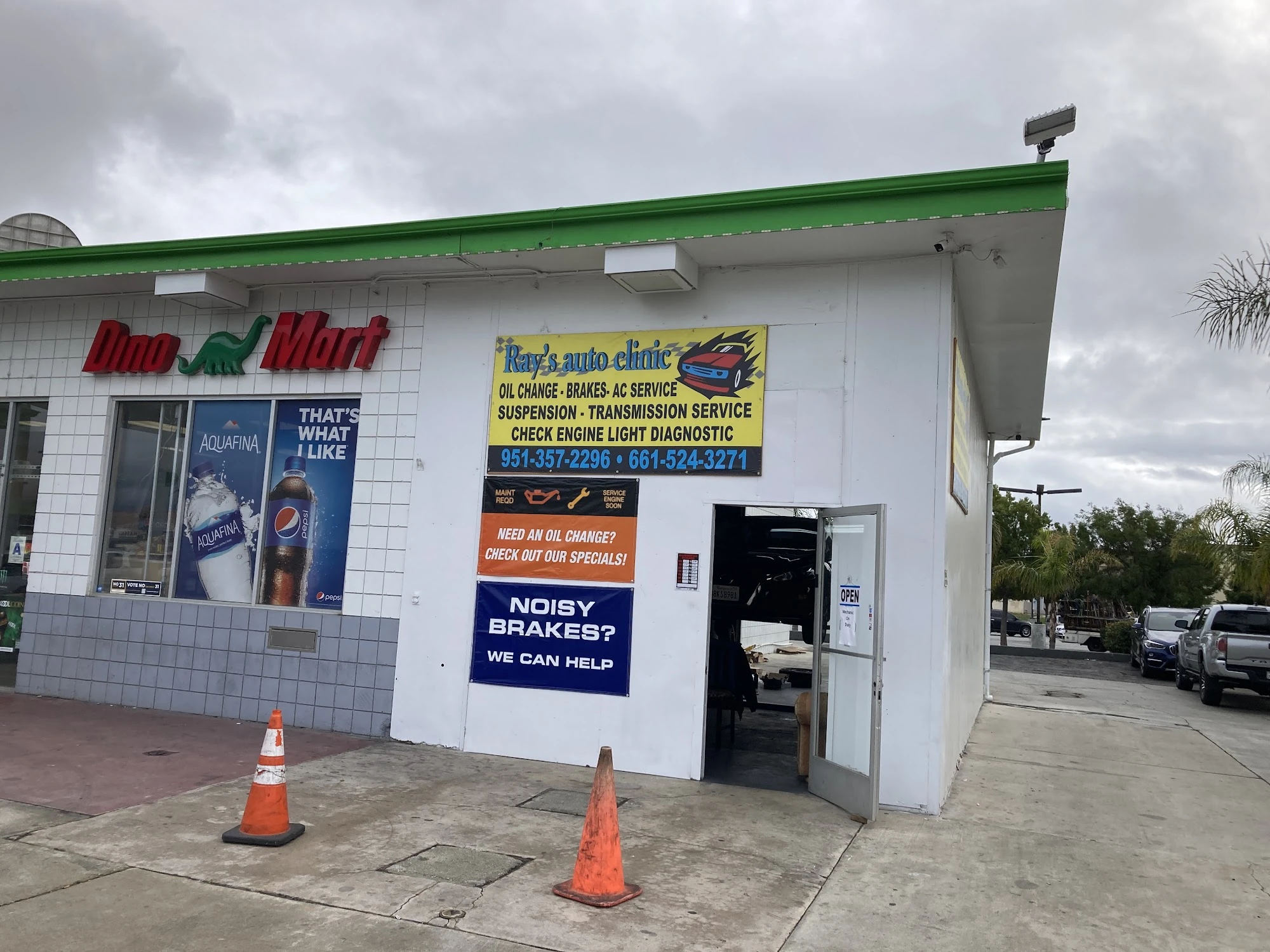 Ray's Auto Clinic storefront next to Dino Mart at 1701 W Florida Ave in Hemet